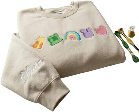 Embroidered Lucky Symbols Sweatshirt Women Personalized Name Sleeve Detail St Patricks Day Clover Rainbow Pullover Beige Crewneck Magical Marshmallow Theme Custom Long Sleeve Top in Saudi Arabia