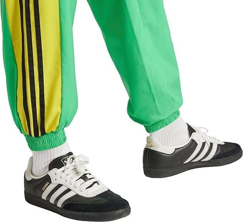 بنطال رياضي فضفاض للرجال من adidas Originals، أخضر طاقة، مقاس متوسط in Saudi Arabia
