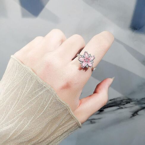 Pink Cherry Blossom Spinning Ring for Women - Adjustable Anxiety Relief Fidget Jewelry, Floral Rotating Stress Ring with Crystal Blossom Design. in Saudi Arabia