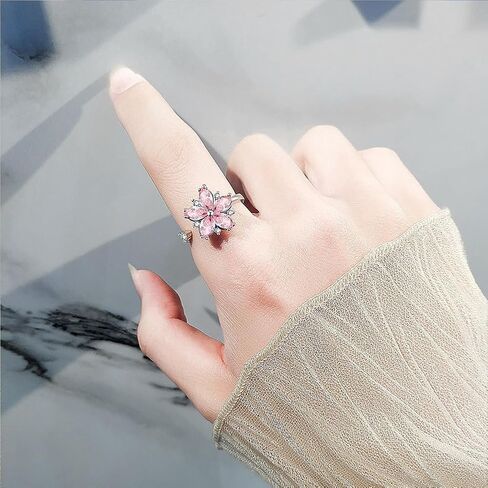 Pink Cherry Blossom Spinning Ring for Women - Adjustable Anxiety Relief Fidget Jewelry, Floral Rotating Stress Ring with Crystal Blossom Design. in Saudi Arabia