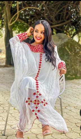 Traditional Ethiopian Habesha Dress – Elegant White with Red Geometric Embroidery in Saudi Arabia