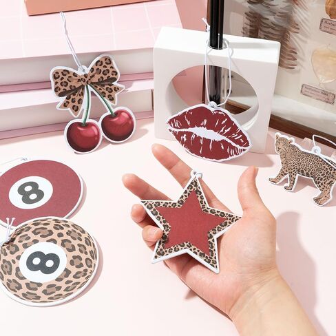 معطرات هواء السيارة العصرية ذات الفهد الأحمر - 12 قطعة من معطرات الجو الرجعية Preppy Cheetah Lucky 8 Ball Stars المعلقة للنساء، ديكور داخلي لتحديث الهواء لمرآة السيارة وهدايا عيد الميلاد المنزلية in Saudi Arabia