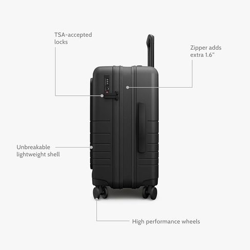 حقيبة Monos Pro قابلة للتوسيع (22 بوصة)، حقيبة سفر صلبة قابلة للتوسيع مع جيب أمامي، قفل TSA، معتمدة من شركات الطيران، أسود منتصف الليل in Kuwait