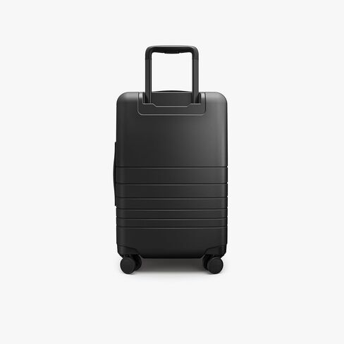 حقيبة Monos Pro قابلة للتوسيع (22 بوصة)، حقيبة سفر صلبة قابلة للتوسيع مع جيب أمامي، قفل TSA، معتمدة من شركات الطيران، أسود منتصف الليل in Kuwait