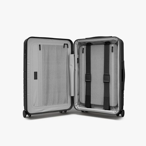 حقيبة Monos Pro قابلة للتوسيع (22 بوصة)، حقيبة سفر صلبة قابلة للتوسيع مع جيب أمامي، قفل TSA، معتمدة من شركات الطيران، أسود منتصف الليل in Kuwait