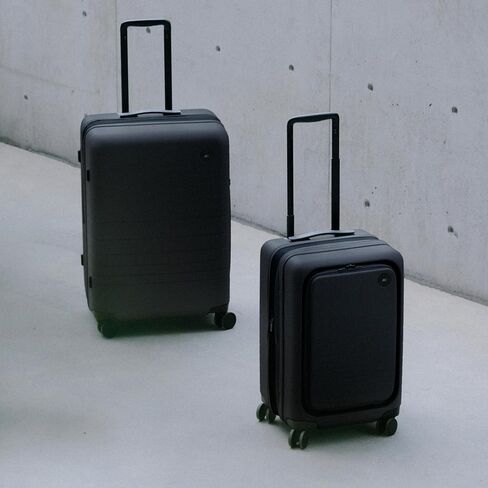 حقيبة Monos Pro قابلة للتوسيع (22 بوصة)، حقيبة سفر صلبة قابلة للتوسيع مع جيب أمامي، قفل TSA، معتمدة من شركات الطيران، أسود منتصف الليل in Kuwait