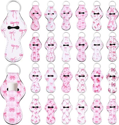 24 قطعة من Yokeer Coquette Pink Bow أحمر الشفاه حامل سلسلة المفاتيح السائبة Coquette Party Favors للنساء Girly Preppy Lip Gloss كم مع مشبك Pink Bow Lip Balm Keychain لحفل زفاف عيد ميلاد العازبة in Saudi Arabia