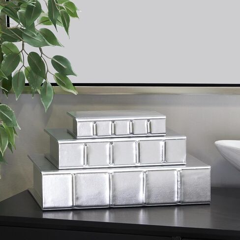 صندوق كوزمو ليفينج من الجلد الصناعي المزخرف من الجلد الصناعي على شكل كتاب مع لمسة نهائية معدنية، مجموعة من 3 صناديق تذكارية مزخرفة مقاس 30.48 سم، 22.86 سم، ارتفاع 15.24 سم، فضي in Kuwait