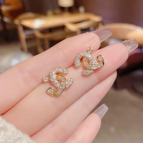 Golden Crystal Interlocking Stud Earrings, Cubic Zirconia, Hypoallergenic Alloy, Small Size, Trendy Design, Front and Back Style, Luxury Gift Jewelry for Women in Saudi Arabia