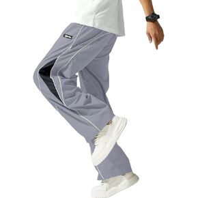 سروال باراشوت رجالي مريح ومطرز بحروف وكتلة ألوان ورباط وخصر رياضي غير رسمي in Kuwait