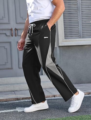 Mens Relax Fit Parachute Pants Letter Embroidery Color Block Panel Drawstring Waist Casual Sports Jogger Sweatpants in Saudi Arabia
