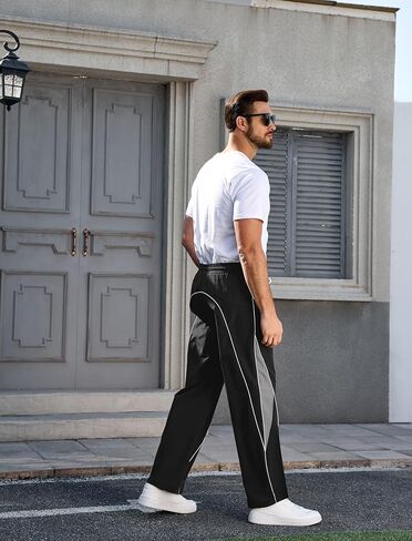 Mens Relax Fit Parachute Pants Letter Embroidery Color Block Panel Drawstring Waist Casual Sports Jogger Sweatpants in Saudi Arabia
