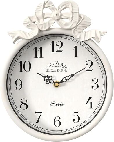 ساعة حائط فرنسية صغيرة مع فيونكة، طراز بوهو أبيض عاجي عتيق، ساعات حائط مزخرفة تعمل بالبطارية الصامتة للمزرعة وغرفة النوم والحمام وهدايا المنزل الجديد (10 بوصة ارتفاع × 7.9 بوصة عرض) in Kuwait