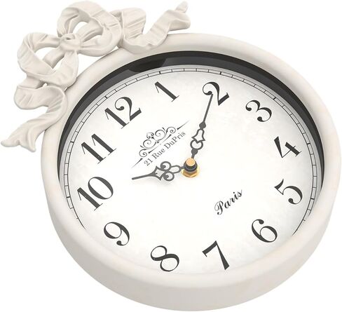 ساعة حائط فرنسية صغيرة مع فيونكة، طراز بوهو أبيض عاجي عتيق، ساعات حائط مزخرفة تعمل بالبطارية الصامتة للمزرعة وغرفة النوم والحمام وهدايا المنزل الجديد (10 بوصة ارتفاع × 7.9 بوصة عرض) in Kuwait