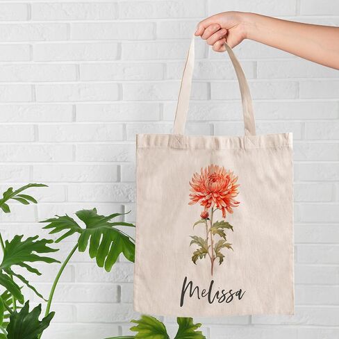 حقيبة يد نسائية مخصصة تحمل الاسم وزهرة الميلاد، مقاس 16 × 15، 12 زهرة، اقتراح وصيفة العروس، التقاعد in Kuwait