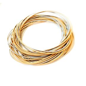 moonlidesigns Stainless Steel Coil Bracelets Set of 20 Guitar Strings 10 Gold 10 Silver Stack Layered Flexible