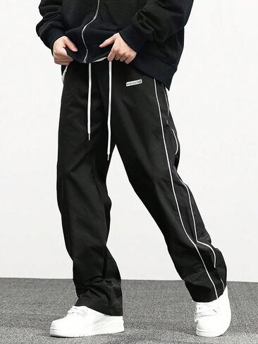 Men’s Baggy Wide Leg Track Pants Drawstring Waist Windproof Parachute Pants with Contrast Side Stripes and Logo Label in Saudi Arabia