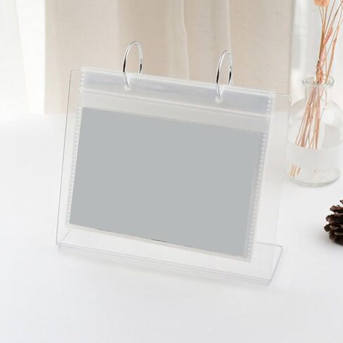 ألبوم صور بإطار فليب على سطح الطاولة مكون من 68 جيبًا وتقويم مكتبي وإطار ملصق وحامل لافتة عرض أكريليك لتزيين المنزل/المكتب، 6.61 × 5.31 بوصة in Kuwait