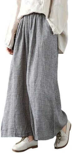 Retro-Style Wide-Leg Straight-Leg Pants with a Black and White Checkered Pattern and a Relaxed fit. in Saudi Arabia