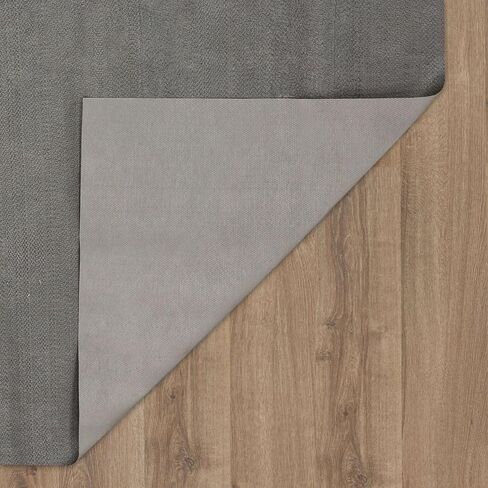 Mohawk Home Low Profile Waterproof Rug Pad Utility Solid Gray 9' X 12' Pet and Kid Proof Rug Pad Perfect for Kitchen, Living Room, Kids Room, Dining Room in Saudi Arabia