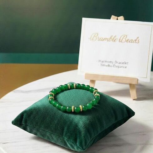 St Patrick's Day Green Glass Beaded Stretch Bracelet with 18K Gold Plated Spacers, 8mm Beads, 7 Inch Circumference in Saudi Arabia
