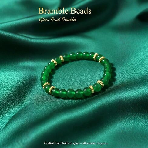 St Patrick's Day Green Glass Beaded Stretch Bracelet with 18K Gold Plated Spacers, 8mm Beads, 7 Inch Circumference in Saudi Arabia