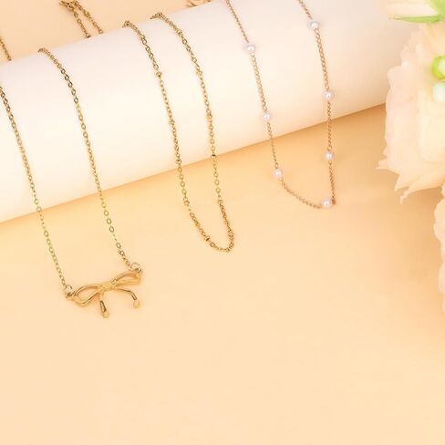 3 قطع قلادة ذهبية للنساء، قلادة على شكل فيونكة من اللؤلؤ عيار 14 قيراط مطلية بطبقات من الذهب سلسلة مكدسة أنيقة وجذابة وعصرية هدايا مجوهرات نسائية in Kuwait