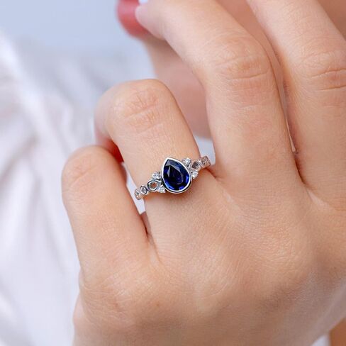 Angara Natural Blue Sapphire Ring for Women | Bezel Set Vintage Pear Sapphire Ring with Diamond Accents in 14K Solid Gold/Platinum | September Birthday, Gemstone Jewellery Gift in Saudi Arabia