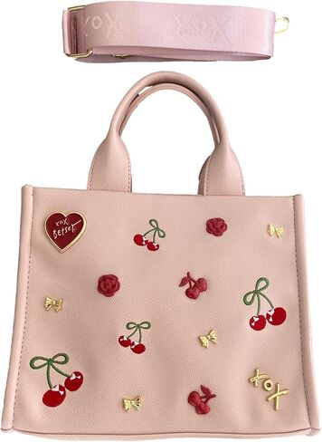 Betsey Johnson XO Nora Textured Blush Faux Leather 3D Red Roses, Gold Tone Bows, XOX Betsey Heart & Insignia with 3D & Embroidered Cherries Detail SMALL Top Handle Tote Shoulder Bag Handbag in Saudi Arabia