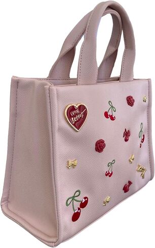 Betsey Johnson XO Nora Textured Blush Faux Leather 3D Red Roses, Gold Tone Bows, XOX Betsey Heart & Insignia with 3D & Embroidered Cherries Detail SMALL Top Handle Tote Shoulder Bag Handbag in Saudi Arabia