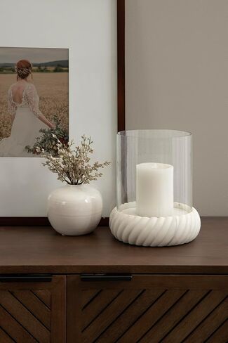 Kate and Laurel Trenza Modern Marble Candle Holder with Glass Cylinder, 8 x 8 x 9, White Marble, Transitional Twisted Base Pillar Candle Holder with Hurricane for Entryway or Living Room Decor in Saudi Arabia