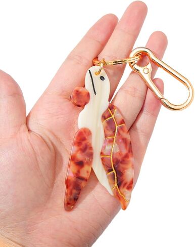 حقيبة سلحفاة بحرية وسلسلة مفاتيح - سلحفاة حقيقية من الأسيتات مع حلقة صدفة ذهبية اللون ومشبك جراد البحر in Kuwait