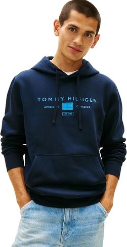 سويت شيرت بقلنسوة من القطن متوسط ​​الوزن للرجال من Tommy Hilfiger مع رسم مطبوع على الصدر in Saudi Arabia
