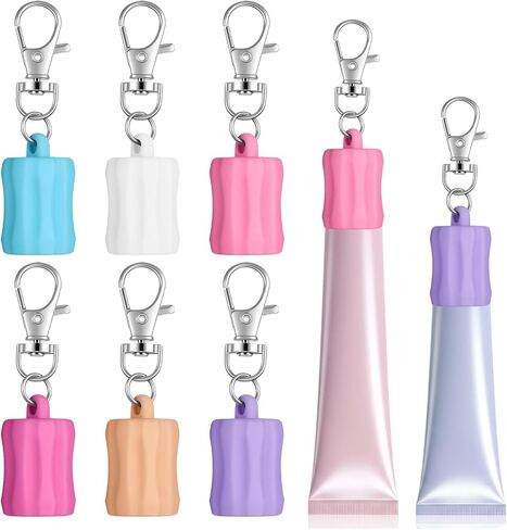 6 قطع من سلسلة مفاتيح ملمع الشفاه، سلسلة مفاتيح حامل ملمع الشفاه من السيليكون، سلاسل مفاتيح ملونة قابلة للحمل بغطاء ملمع الشفاه للمحفظة والمحفظة وحقيبة الظهر وإكسسوارات المفاتيح الساحرة، 6 ألوان in Kuwait
