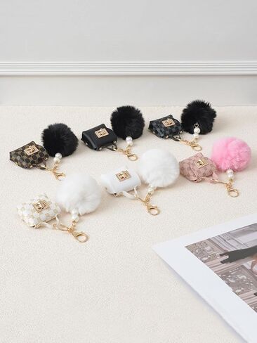 Mini PU Coin Purse Keychain with Plush Ball Decorative Bag Charm for Women in Saudi Arabia