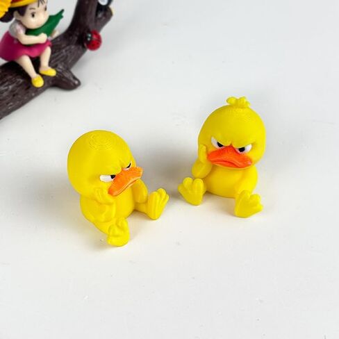 3D Printed Grumpy Furry Sitting Yellow Duck Figurine - Mini Desktop Ornament & Kids Toy for Home Decor 4.5g in Saudi Arabia