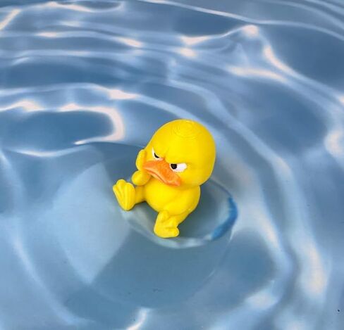 3D Printed Grumpy Furry Sitting Yellow Duck Figurine - Mini Desktop Ornament & Kids Toy for Home Decor 4.5g in Saudi Arabia