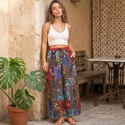 بنطلون نسائي من Ezhippie بوهو مزين بالزهور واسع الساق بخصر مطاطي مرقع من القطن للمهرجانات in Kuwait