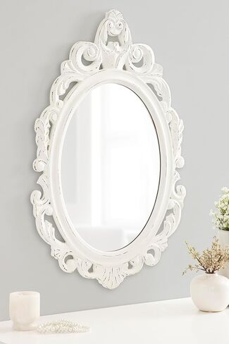 Kate and Laurel Pietra Traditional Decorative Oval Wall Mirror, 20 x 32, White, Soft Vintage Mirror with Ornate Carved Detailing for Small Powder Room Vanity in Saudi Arabia