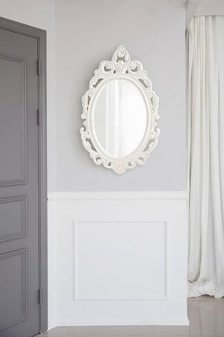 Kate and Laurel Pietra Traditional Decorative Oval Wall Mirror, 20 x 32, White, Soft Vintage Mirror with Ornate Carved Detailing for Small Powder Room Vanity in Saudi Arabia