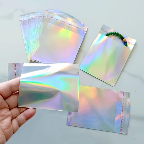 100 PCS Holographic Self Sealing Envelopes Bags 4x5 Glitter Adhesive Mylar Treat Goodie Bags for Sample Packaging Party Supplies in Saudi Arabia