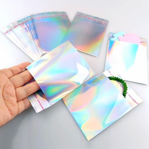 100 PCS Holographic Self Sealing Envelopes Bags 4x5 Glitter Adhesive Mylar Treat Goodie Bags for Sample Packaging Party Supplies in Saudi Arabia