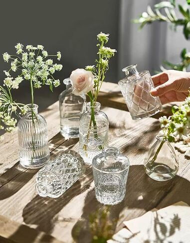 مجموعة مزهريات زجاجية مكونة من 22 قطعة، مزهريات صغيرة شفافة على شكل زهرة صغيرة لتزيين طاولة الزفاف المركزية، مزهريات صغيرة عتيقة لغرفة المنزل وتناول الطعام وديكور مركز الطاولة (شفاف، 22 حزمة) in Kuwait
