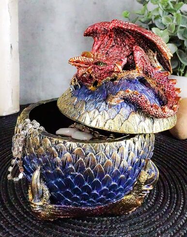 هدية Ebros، صندوق مجوهرات مزخرف باللون الأحمر Wyrmling Juvenile Dragon على مخلب متقشر، تمثال صندوق مجوهرات مزخرف على شكل بيضة زرقاء ذهبية مقاس 5.25 سم، أساطير خيالية عالية الزنزانات والتنينات، صندوق مخبأ قابل للتجميع in Saudi Arabia
