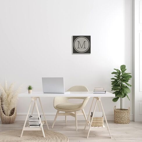 Stupell Industries Modern M Initial Circular Elevator Key Shape Framed Wall Art in Saudi Arabia