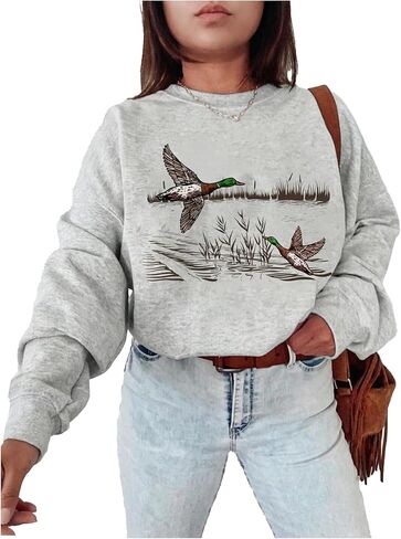 WDIRARA Women's Graphic Sweatshirt Crewneck Long Sleeve Pullover Tops Streetwear in Saudi Arabia