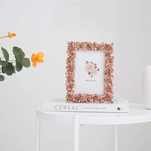 إطار صورة من الراتنج على طراز الحديقة مزين بزهرة الورد مع لوح زجاجي بليكسي عالي الدقة لعرض الصور على سطح الطاولة، لون ذهبي وردي، 5 × 7 بوصة in Kuwait