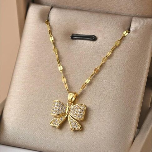 Gold/Silver-Tone Chain,Elegant Irregular Bow Pendant Necklace Collection, CZ Paved Design,Daily & Party Jewelry in Saudi Arabia