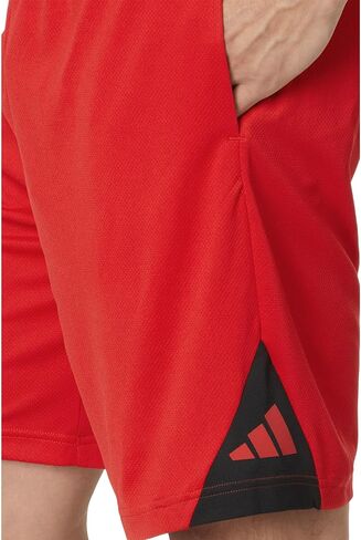 شورت رياضي Badge of Sport للرجال من adidas Originals، Better Scarlet/Black، درزة داخلية متوسطة 9 بوصة in Saudi Arabia