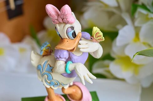 Enesco Disney Traditions Collection by Jim Shore Daisy Duck with Flowers and Butterflies Figurine- Stone Resin Hand Painted Collectible Disney Figurines Home Decor Statue, 5 Inch in Saudi Arabia